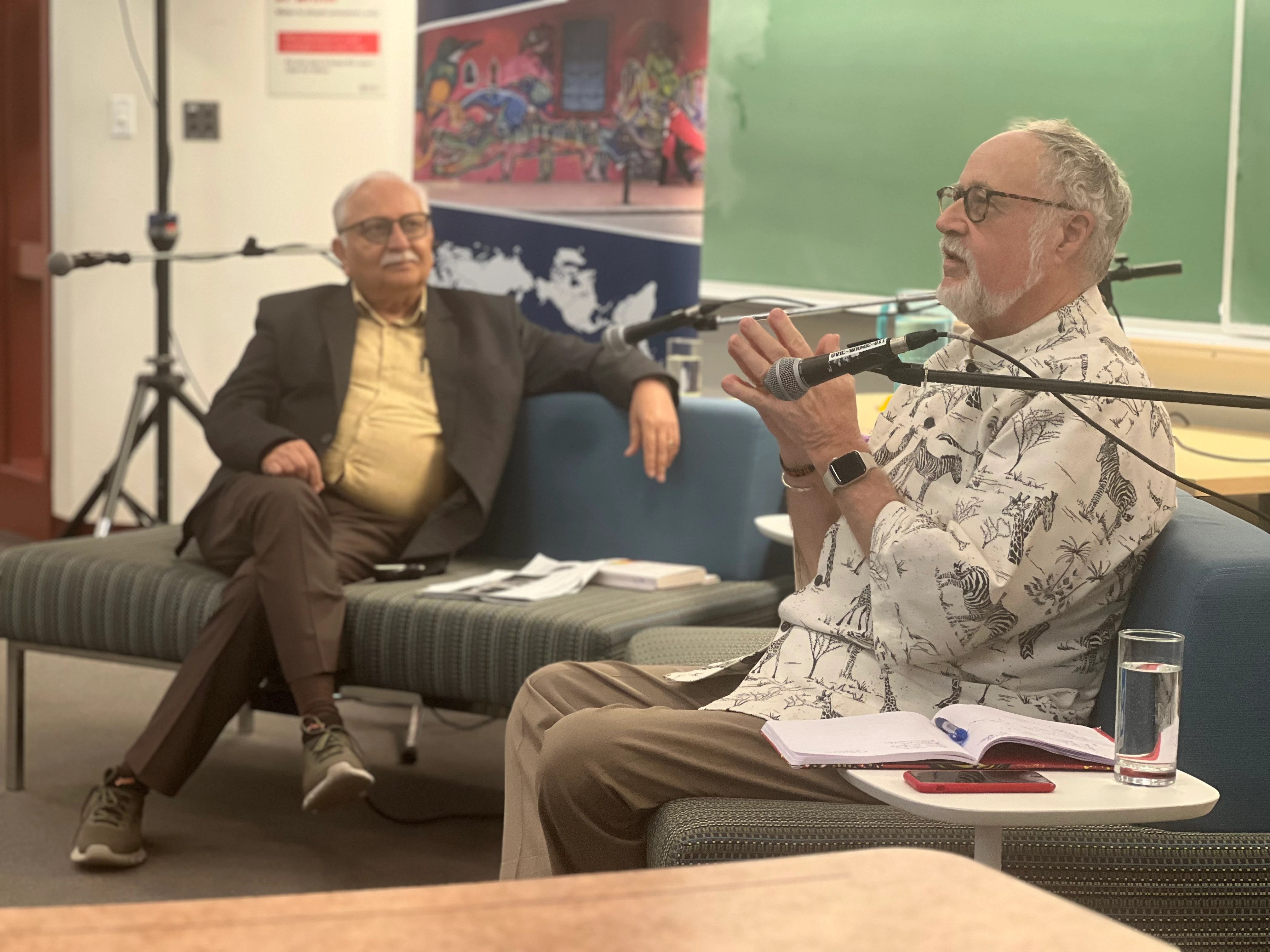 Rajesh Tandon and Budd Hall giving a lecture on community-based participatory research in April 2025.