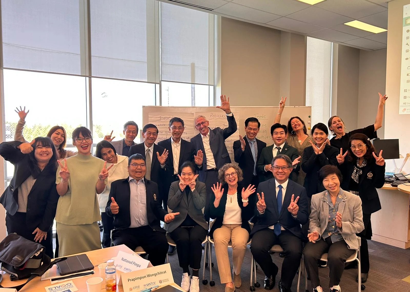 Group photo of the executives and staff from Mahidol University in Bangkok, Thailand who came to the University of Victoria to participate in the second part of the "Developing a Sustainability Mindset" course.